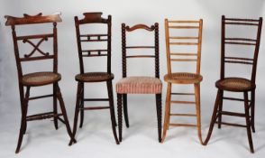 FIVE VARIOUS NINETEENTH CENTURY CORRECTION CHAIRS, comprising, four with oval, caned seats and