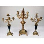 ORNATE HEAVY CAST BRASS THREE LIGHT CANDELABRA, with three leaf cast scroll arms issuing from a