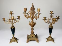 ORNATE HEAVY CAST BRASS THREE LIGHT CANDELABRA, with three leaf cast scroll arms issuing from a