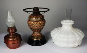 VICTORIAN MOULDED POTTERY AND BLACK GLASS OIL TABLE LAMP, with fittings, 12 ¾” (32.3cm) high,