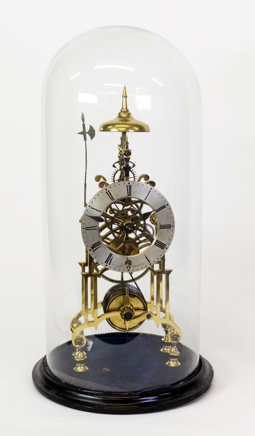 J HEWITT TWIST, MANCHESTER POLISHED BRASS SKELTON CLOCK, the 5 ¼” silver Roman dial, powered by a