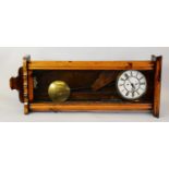 EARLY TWENTIETH CENTURY PINE AND PARTLY VENEERED WALNUT VIENNA WALL CLOCK, the 8” two part Roman