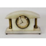 SMITH’S EARLY TWENTIETH CENTURY GILT METAL AND WHITE ALABASTER MANTLE, the 3 ½” Arabic dial, powered