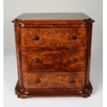 VICTORIAN TABLE TOP BURR WALNUT MINIATURE CHEST OF THREE DRAWERS, the moulded oblong top with