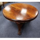 VICTORIAN FIGURED MAHOGANY BREAKFAST TABLE, the circular, flame cut, tilt top with plain frieze, set