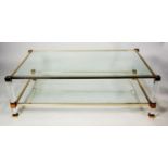 PIERRE VANDEL GLASS AND GOLD PLATED METAL MOUNTED LUCITE COFFEE TABLE, of oblong form with bevel cut
