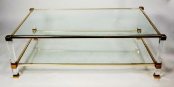 PIERRE VANDEL GLASS AND GOLD PLATED METAL MOUNTED LUCITE COFFEE TABLE, of oblong form with bevel cut