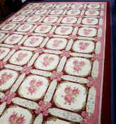 VERY LARGE MODERN MACHINE MADE CARPET with a repeat pattery of forty off-white squares, decorated