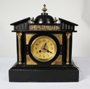 VICTORIAN BLACK SLATE MANTLE CLOCK, the 4 ¾” Arabic gilt dial, powered by a drum shaped Japy & Cie