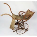 NINETEENTH CENTURY THONET STYLE BENTWOOD FOLDING BATHING OR INVALID CHILD’S CHAIR, with canvas