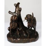 PATINATED BRONZE GROUP OF A PAIR OF HUNTING DOGS, SIGNED JOHNSON, one modelled seated, the other