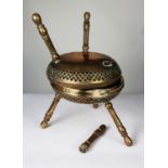 PAIR OF INDIAN ENGRAVED AND PIERCED BRASS FOOT WARMING STOOLS, each of circular form with bands of