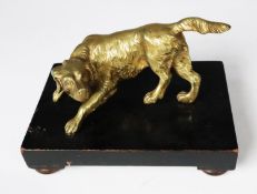 POLISHED BRASS MODEL OF A RETRIEVER DOG, modelled standing and facing to the left, mounted on an