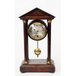 H A C EARLY TWENTIETH CENTURY MAHOGANY STAINED AND GILT METAL MOUNTED PORTICO MANTLE CLOCK, the 2 ¾”
