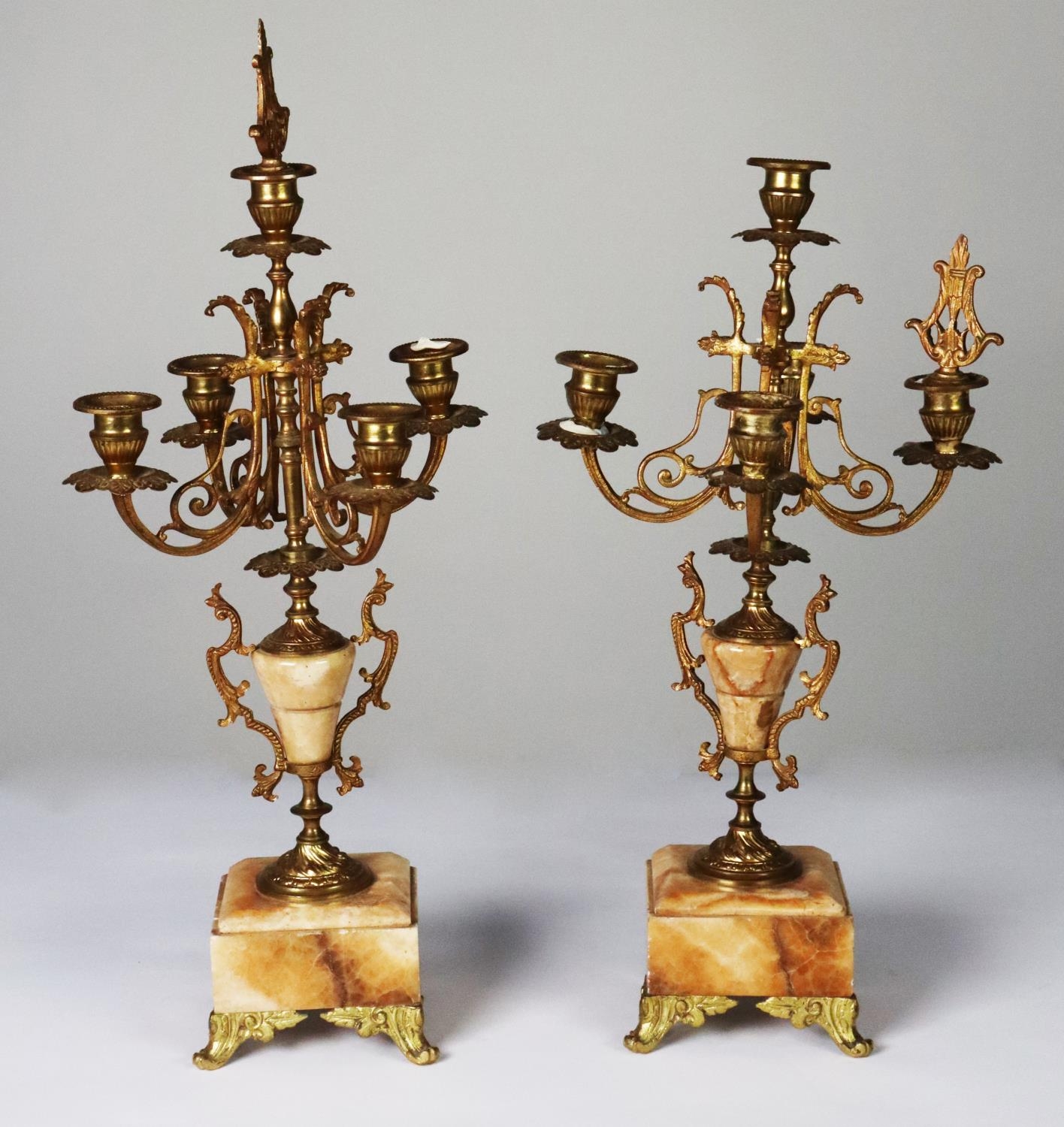 PAIR OF LATE NINETEENTH CENTURY GILT METAL AND ONYX FIVE LIGHT CANDELABRA, original part of a