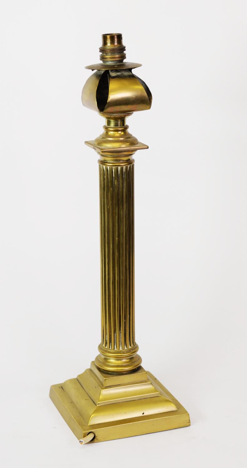 EARLY TWENTIETH CENTURY BRASS COLUMN TABLE LAMP, of fluted form with stepped square base, 19 ½” (