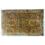 PERSIAN LARGE RUG, with centre medallion in blue, white and pink, on a faded red field with