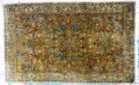 PERSIAN LARGE RUG, with centre medallion in blue, white and pink, on a faded red field with