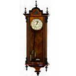 LATE NINETEENTH CENTURY WALNUT AND EBONISED CASED VIENNA WALL CLOCK, the 8” two part Arabic dial