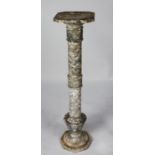 TWENTIETH CENTURY CARVED GREY VEINED MARBLE PEDESTAL, of wrythen fluted form with octagonal foot and