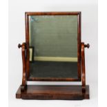 NINETEENTH CENTURY MAHOGANY TOILET MIRROR, WITH OBLONG PLATE, SCROLL SUPPORTS AND SHAPED OBLONG BASE