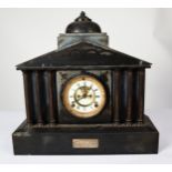 EDWARDIAN BLACK SLATE PRESENTATION MANTLE CLOCK, the 5” Roman dial with visible brocot escapement to