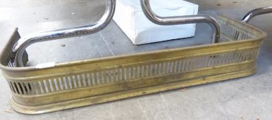 A PIERCED BRASS FIRE CURB (79cm long x 32cm deep x 13cm high)