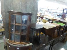 A NEST OF THREE MAHOGANY CIRCULAR TOP TABLES AND A SMALL GLAZED FRONT CORNER CABINET AND TEAK SEWING