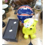 TWO POTTERY MONEY BOXES (UNION JACK AND PUDSEY BEAR), AND A WOODEN MONEY BOX AND TWO PLASTIC SHIP