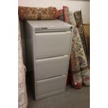 A BISLEY GREY METAL THREE DRAWER FILING CABINET