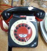 A TELEPHONE HAND SET, PRESS BUTTON DIALING