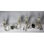 PAIR OF MODERN CUT GLASS TWIN BRANCH WALL LIGHTS, each with chrome fittings ad prism cut drops,