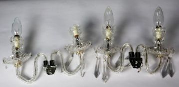 PAIR OF MODERN CUT GLASS TWIN BRANCH WALL LIGHTS, each with chrome fittings ad prism cut drops,