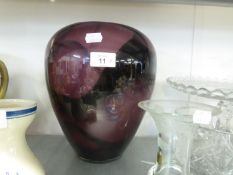A CUT GLASS VASE; A LARGE PURPLE SHADED GLASS OVULAR VASE, 11” HIGH; A PALE BLUE GLASS SHALLOW,