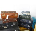 A LEATHER SUITCASE AND VARIOUS OTHER SUITCASES