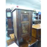 VICTORIAN WALNUTWOOD POT CUPBOARD WITH PANELLED DOOR AND BRASS CASTORS, 34 1/4" (87cm) high