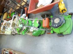 AN OLD ELECTRIC FOUR WHEELED LEAF RAKER AND THREE VARIOUS ROTARY LAWN MOWERS (4)