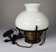 EARLY TWENTIETH CENTURY BRASS AND BLACK METAL RISE AND FALL CEILING OIL LIGHT, converted to