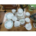 QUEEN ANNE BONE CHINA GREEN LEAF AND FLOWER PATTERN BORDERED TEA SERVICE SUFFICIENT FOR 6 PERSONS,