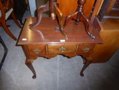 A NINETEENTH CENTURY WALNUT LOW BOY, HAVING THREE DRAWERS AND RAISED ON LONG CABRIOLE LEGS