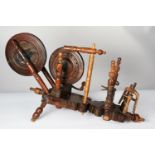 NINETEENTH CENTURY FOREIGN HAND OPERATED, PORTABLE TABLE TOP SPINNING WHEEL OR SIMILAR, with ornate,