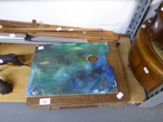 A SMALL BENCH EASEL AND A PORTABLE EASEL (2)
