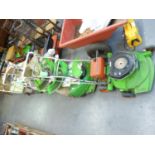 AN OLD ELECTRIC FOUR WHEELED LEAF RAKER AND THREE VARIOUS ROTARY LAWN MOWERS (4)