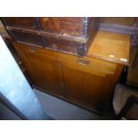 A LIGHT OAK CHIFFONIER BASE HAVING TWO DRAWER OVER TWO CUPBOARDS