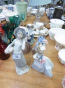 A LLADRO FIGURE OF A GIRL HOLDING A BASKET OF FLOWERS, ANOTHER OF A GIRL HOLDING ORANGES, THREE