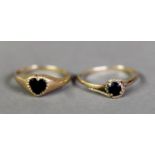 TWO 9ct GOLD RINGS, ONE COLLET SET WITH A HEART SHAPED GARNET, THE OTHER SET WITH A ROUND GARNET,