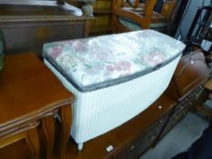 A WHITE LOOM OTTOMAN BOX WITH UPHOLSTERED LID AND A TRIPLE OVAL TOILET MIRROR, IN WHITE AND GILT