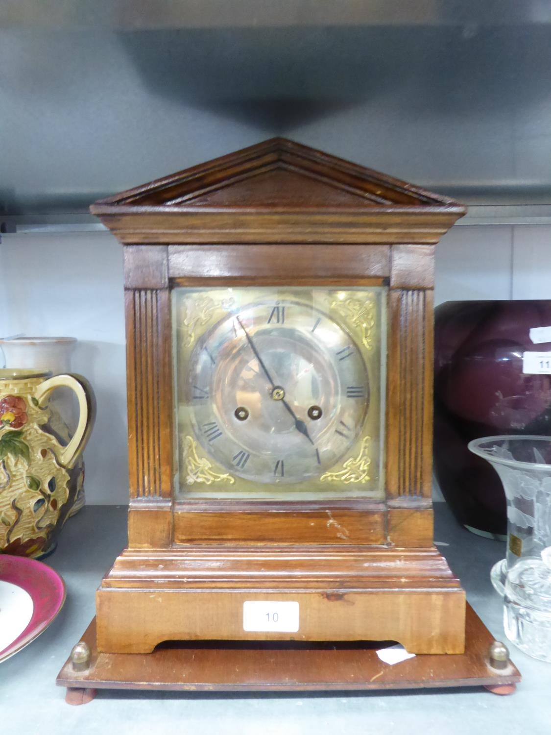 LATE NINETEENTH CENTURY WALNUT CASED MANTLE CLOCK, with 6 ½” silvered Roman dial, spring driven