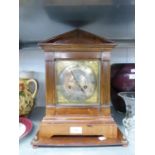 LATE NINETEENTH CENTURY WALNUT CASED MANTLE CLOCK, with 6 ½” silvered Roman dial, spring driven