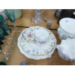 THREE ROYAL CROWN DERBY CHINA DESSERT PLATES WITH FLORAL CENTERS, VINE EMBOSSED AND GILT BORDERS,